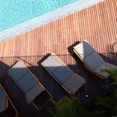 Menlyn Boutique Hotel Pretoria-Noord Exterior foto Sunloungers by a pool